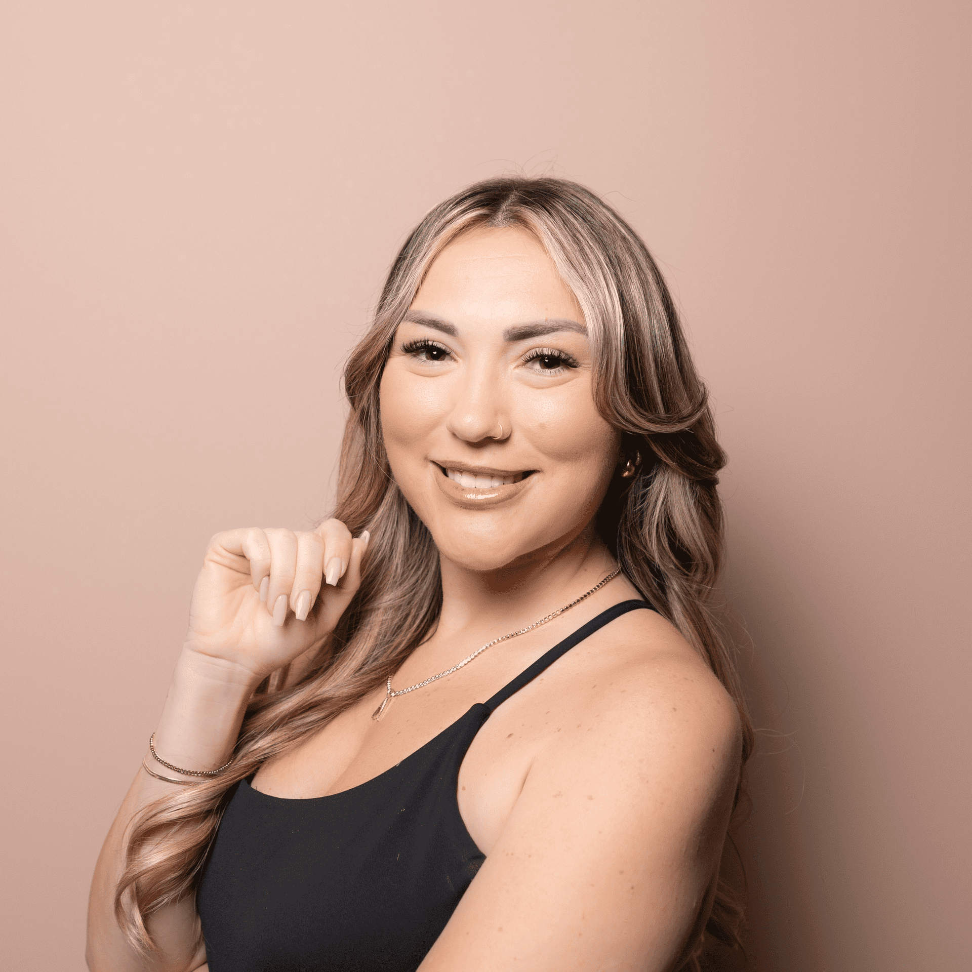 Portrait of Allie King, a professional stylist at Buffalo Glam Salon, showcasing their expertise and style.